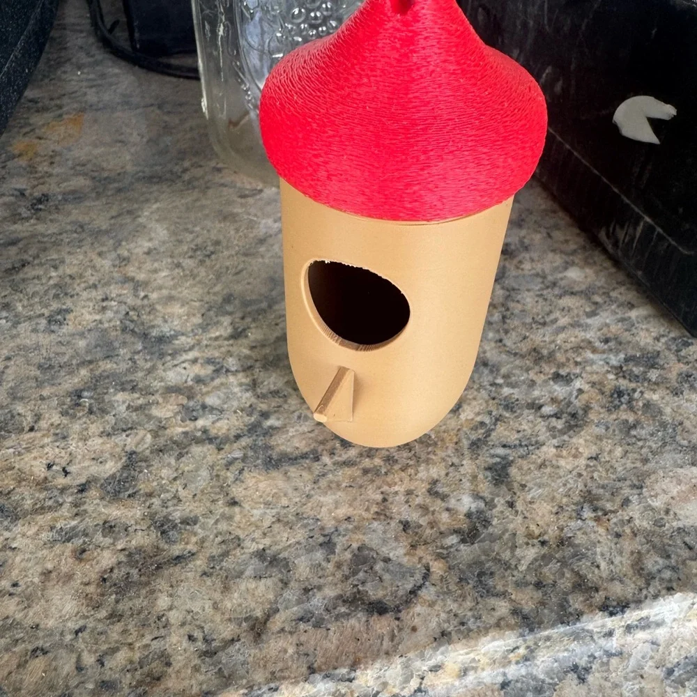 Red and Tan Birdhouse humming bird